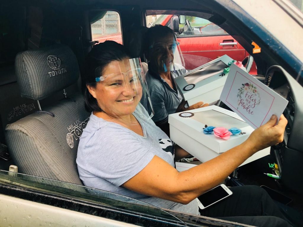 A woman delivering Mother's Day boxes in Bijagua, Costa Rica