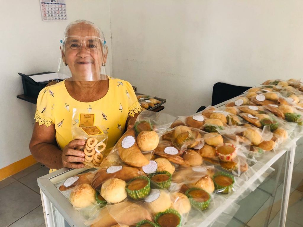 A woman with baked goods in Bijagua, Costa Rica